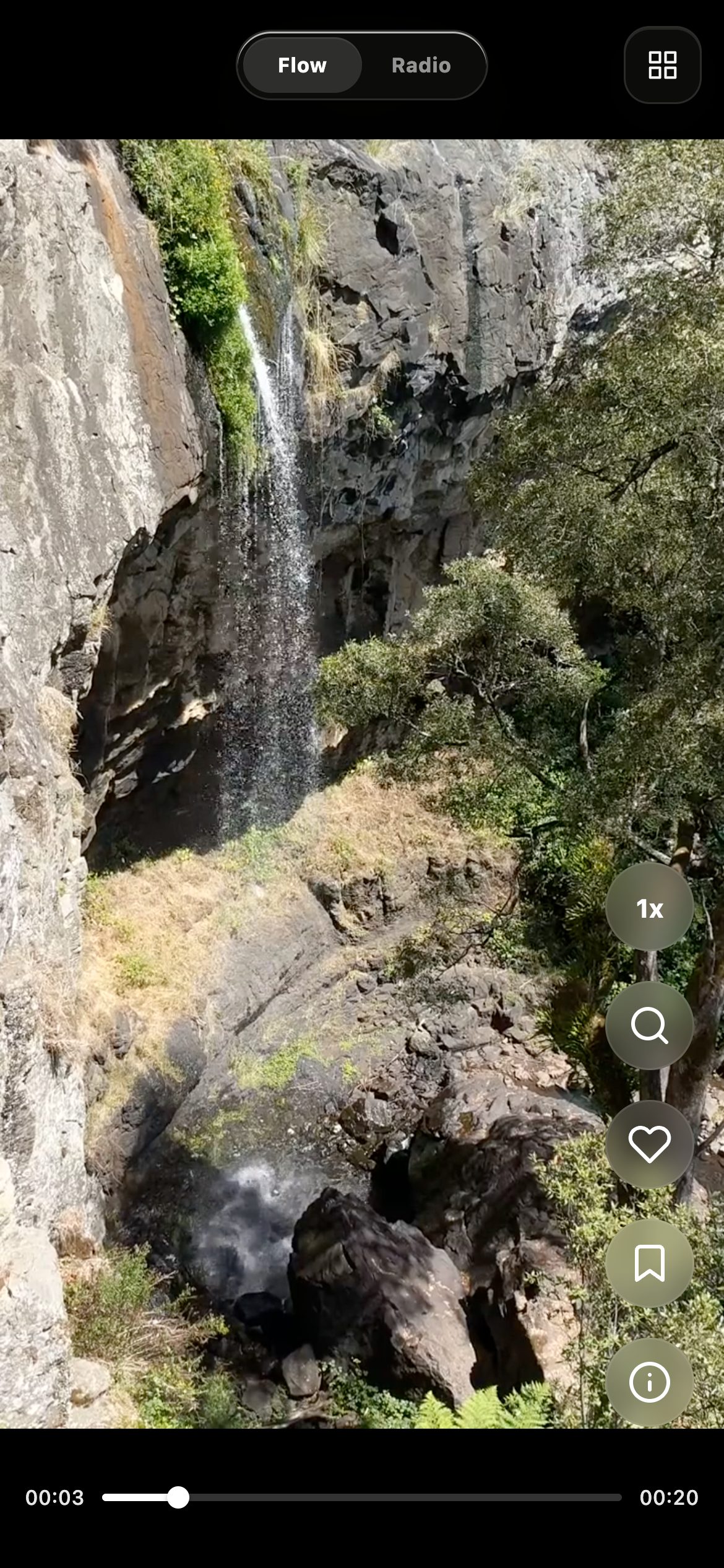 Flow: a full-screen waterfall video with like, save and info actions