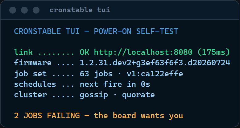 The TUI boot self-test: link latency, firmware, job set, schedules, and cluster probed live, all OK