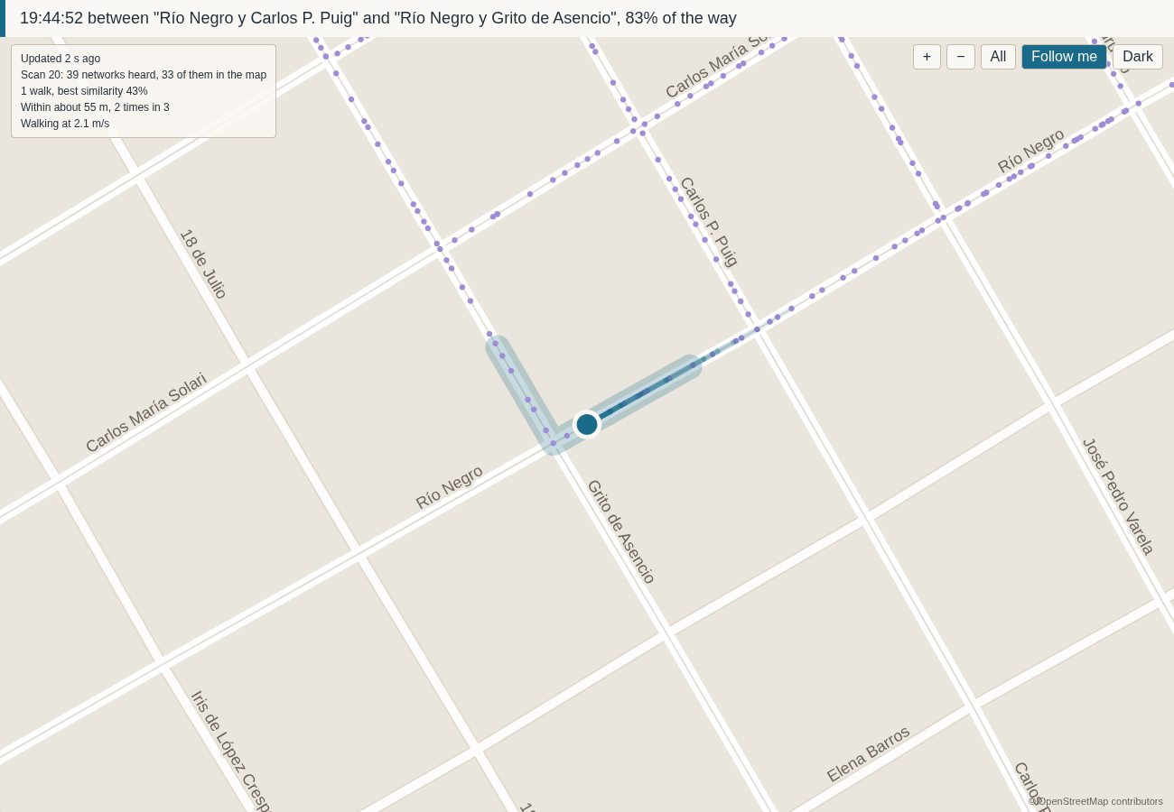The live map in a browser: where the scan puts you on Río Negro, with the streets it may be on shaded around it, the last answers fading behind it, the map's own fingerprints as violet dots, the streets named, and in the corner a panel of what the run is doing.
