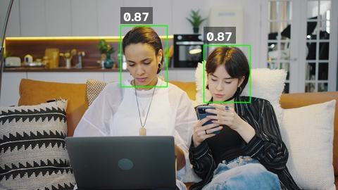 HeadDetection visualization of multi-head bounding boxes with confidence scores on a sample scene