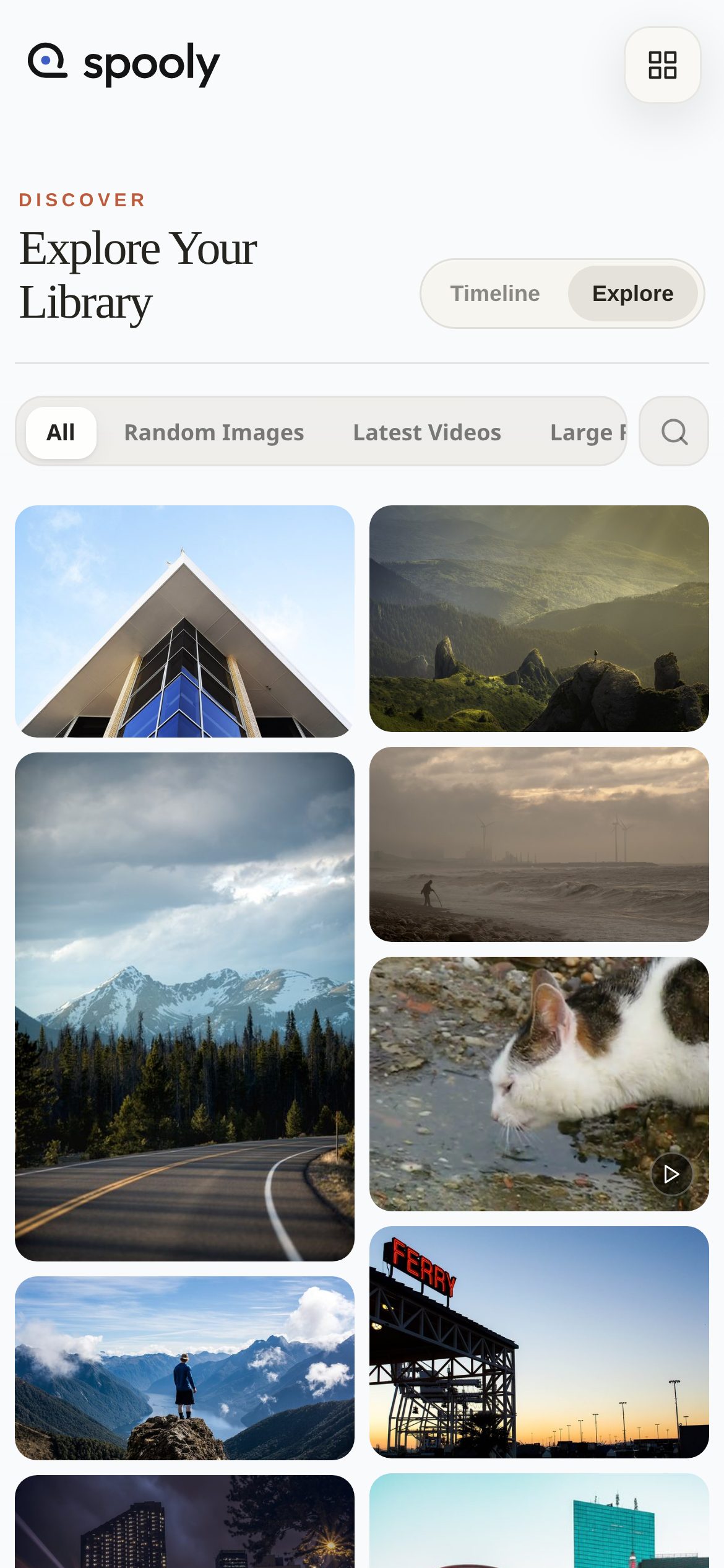 Library: a two-column grid of landscape and city photos