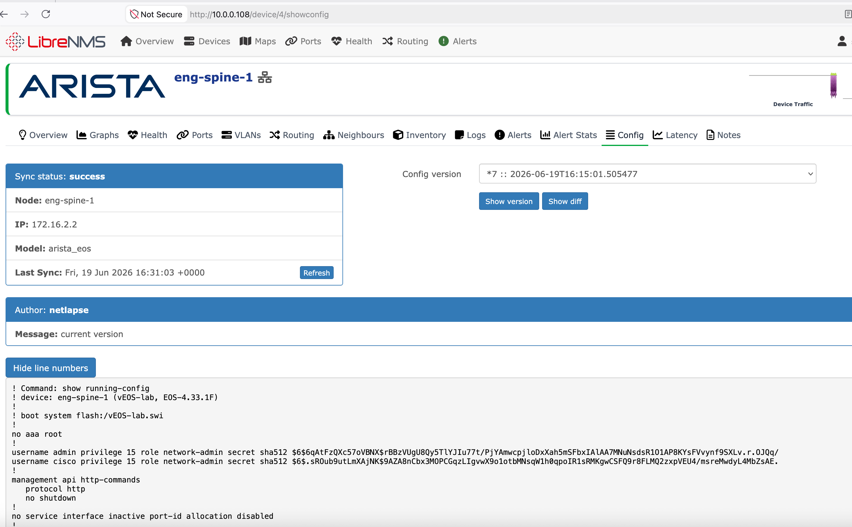 LibreNMS Config tab rendering a Netlapse-served running-config for eng-spine-1