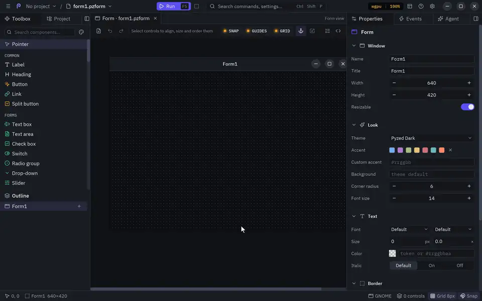 Dragging a button, a text box and a check box from the toolbox onto a form in Pyzed Design