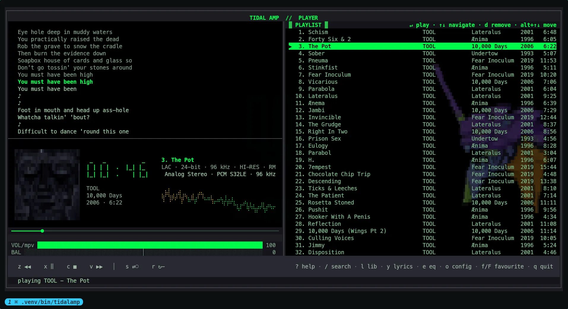 The split arrangement: timed lyrics above the cover and the clock on the left, the queue on the right with a purple armoured figure drawn dimly behind its rows, and the transport keys running across both columns