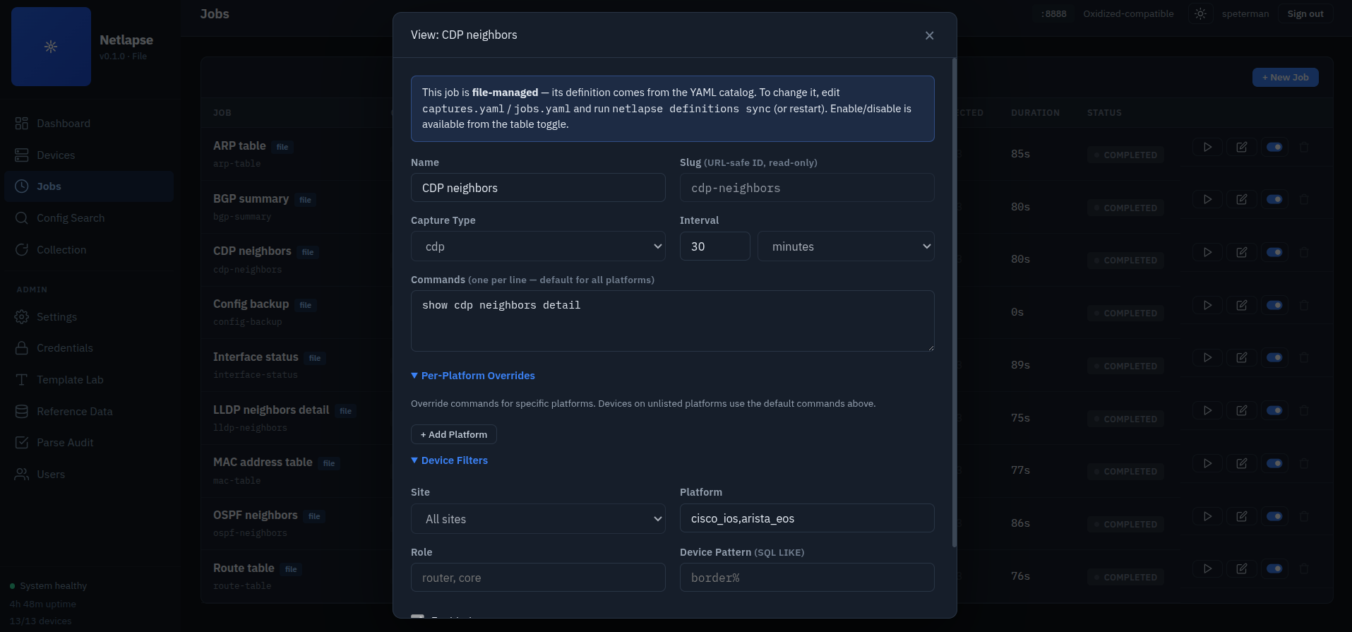 Jobs editor showing a file-managed job — a banner notes the definition comes from the YAML catalog (edit captures.yaml/jobs.yaml and re-sync), with capture type, interval, default command, per-platform overrides, and site/role/platform/device filters