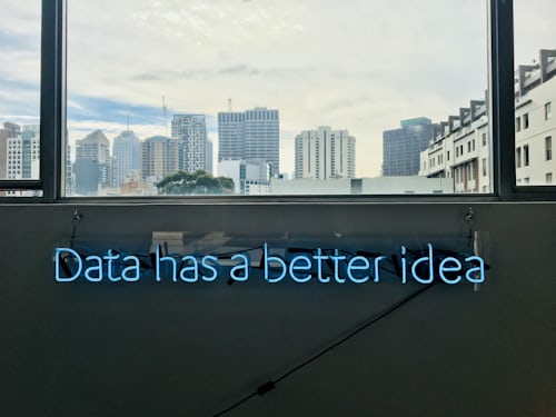 photo of room with light up text saying, 'Data has a better idea'